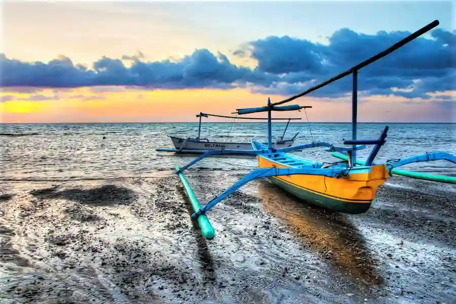 Guests enjoying calm beach and sea activities at Mayo Resort Bali