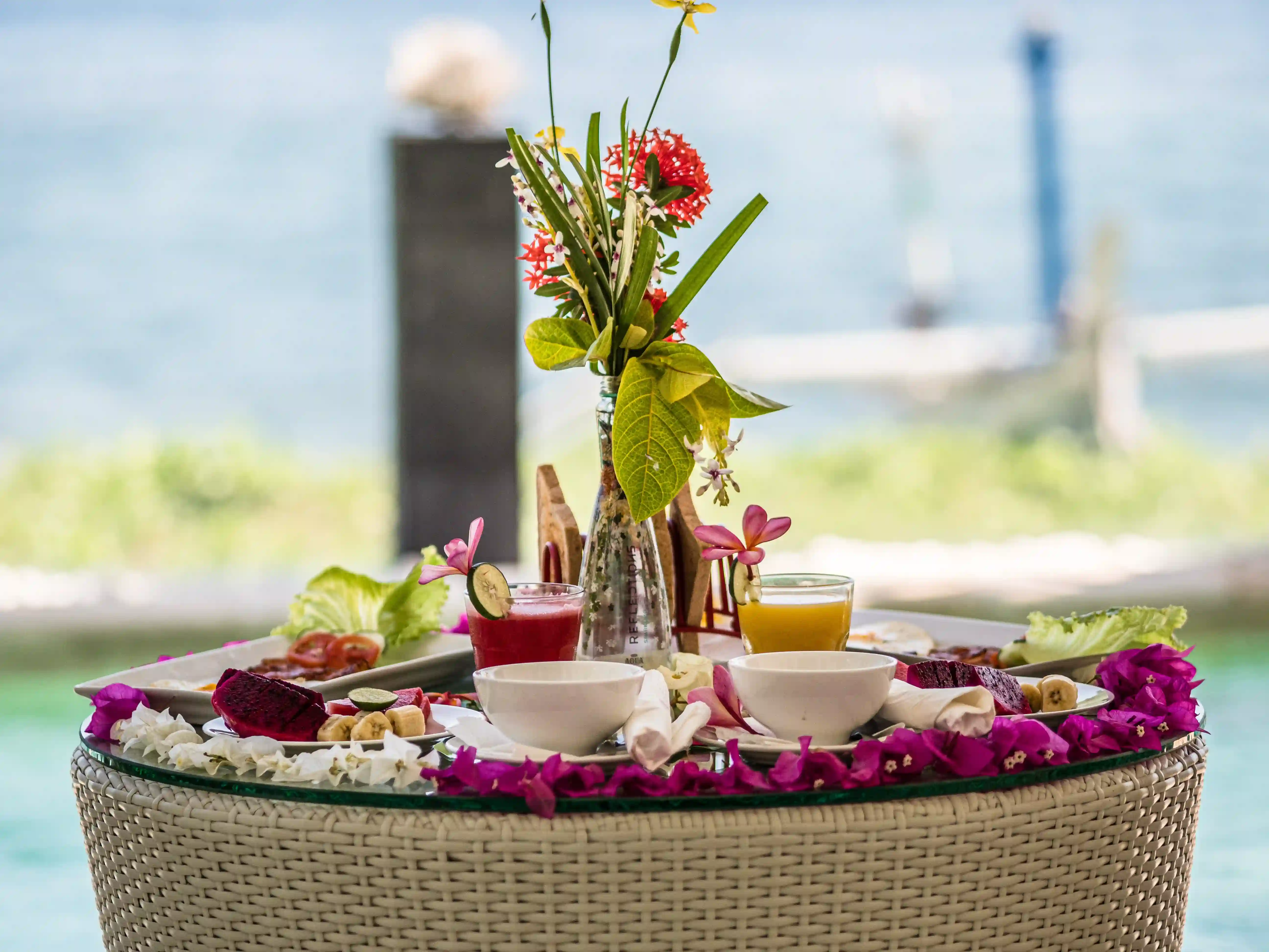 Dining area with ocean view at the beachfront of Mayo Resort Bali